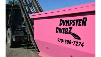 Dumpster Diverz roll-off container at a Fort Collins home renovation site